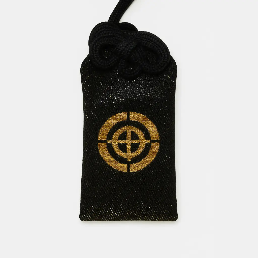 Front of all-purpose protection omamori (十一面守) from Hasedera Temple, black variant – Japanese charm for health, safety, and blessings
