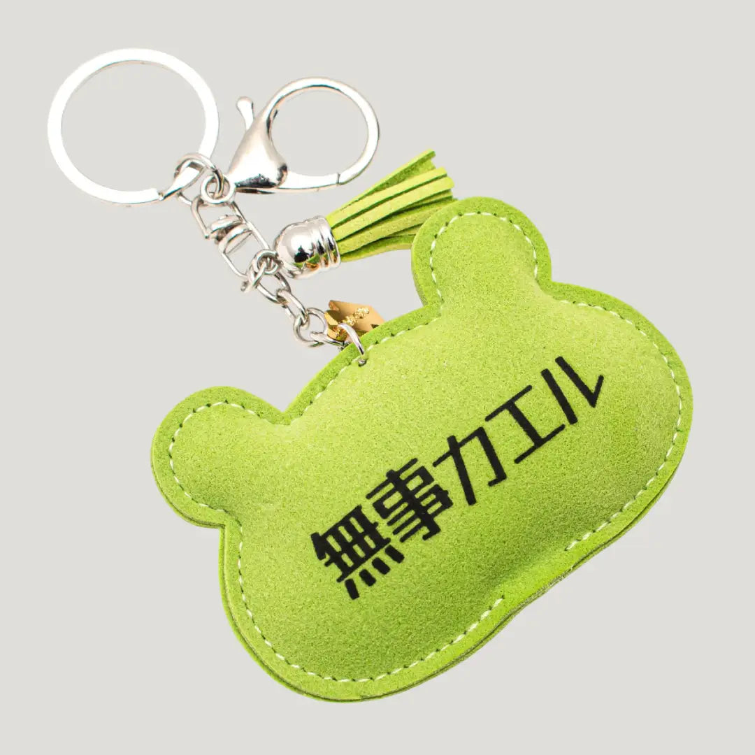 Lucky Frog Omamori (三福かえる守) back side – detail of green frog charm, authentic omamori from Shirasaki Shrine, Japan