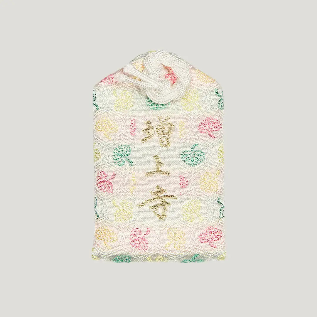 Back of 病気平癒御守 (Recovery & Healing Omamori) from Zojoji Temple – multicolor charm with 増上寺 in gold and rabbit pattern design