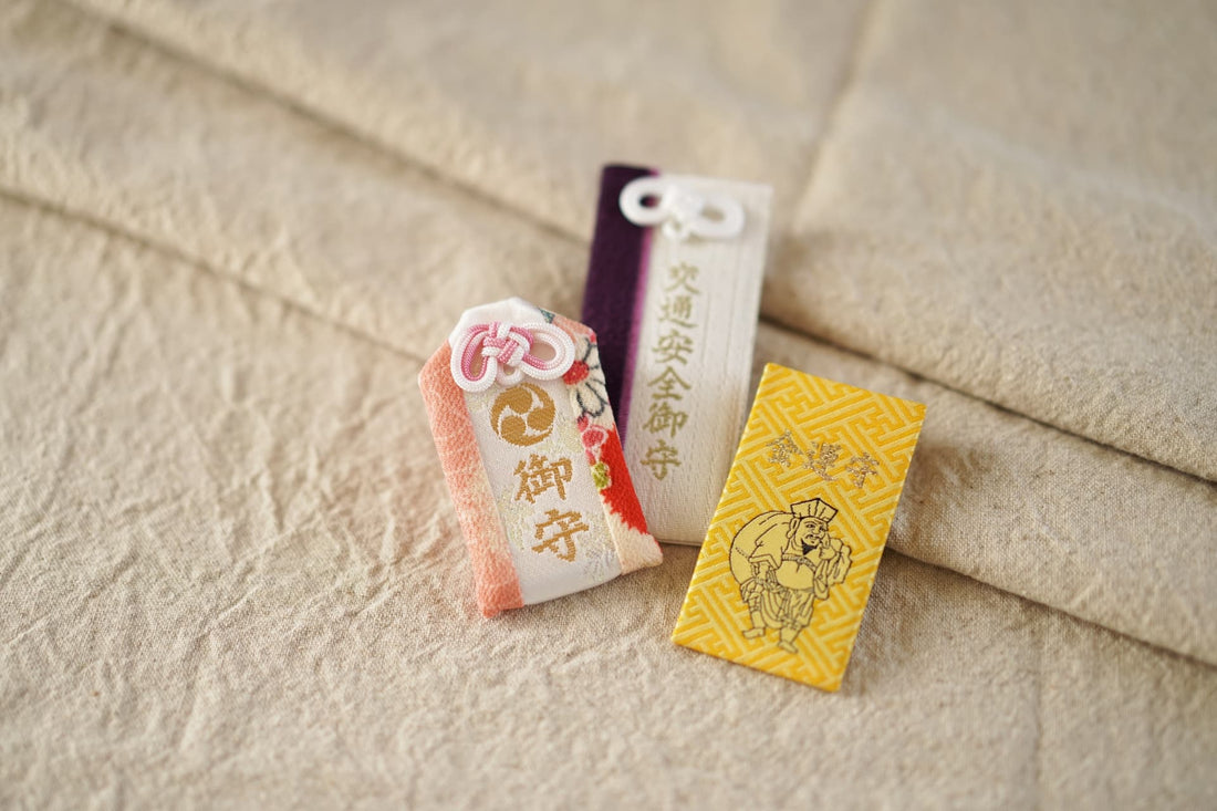 Traditional Japanese omamori charms shown as examples of everyday cultural use