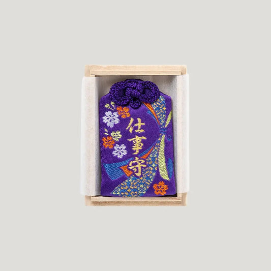 Career Success Omamori with purple embroidery in wooden box from Shirasaki Shrine for job luck and work success