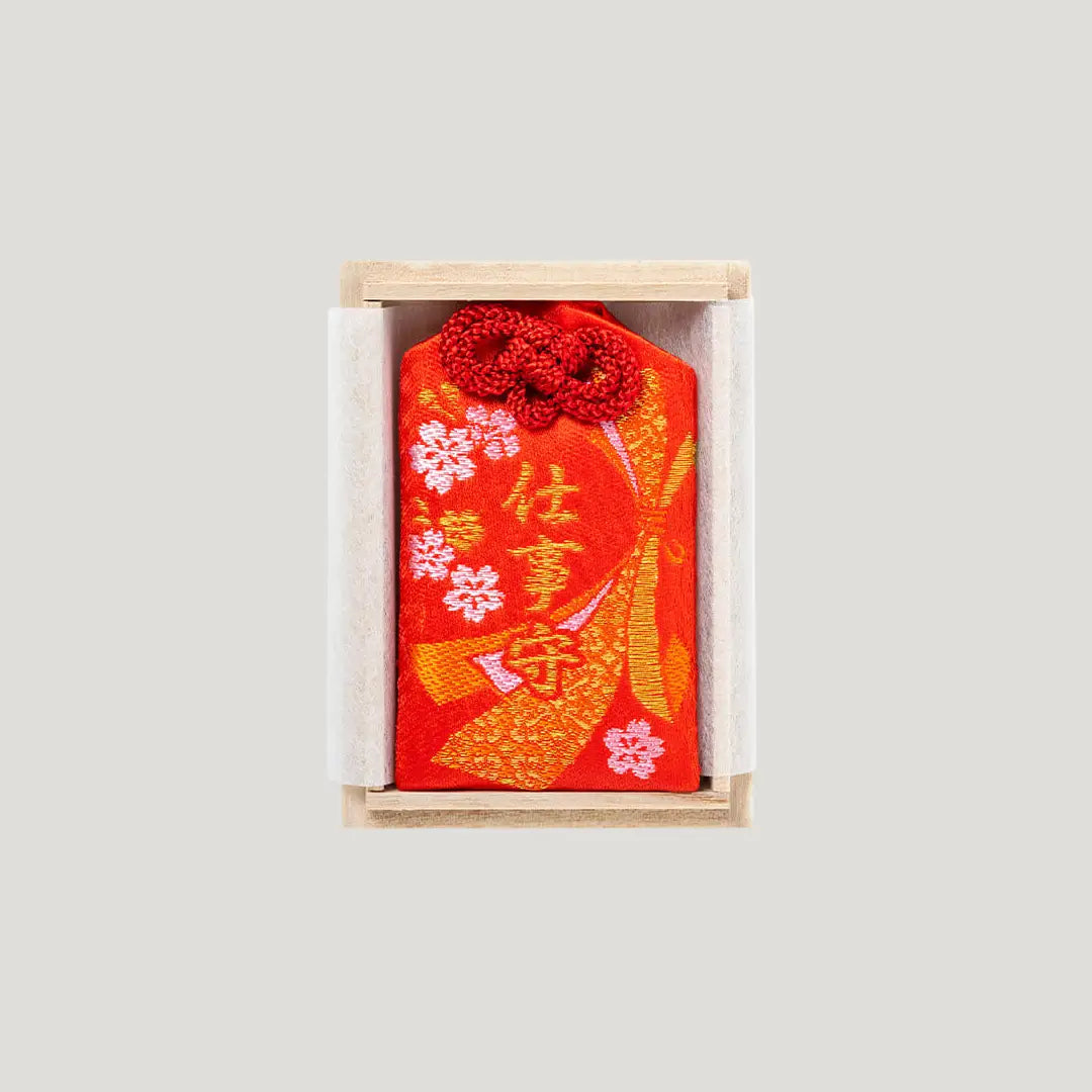 Career Success Omamori with red embroidery in wooden box from Shirasaki Shrine for job luck and work success