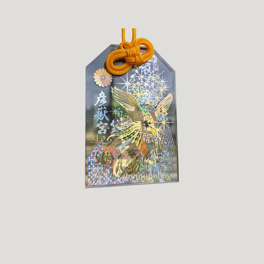 Gold transparent phoenix omamori from Hikotakegu