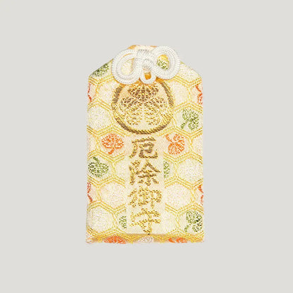 Front of 厄除御守 (Protection from Misfortune Omamori) from Zojoji Temple – multicolor brocade charm with gold embroidery