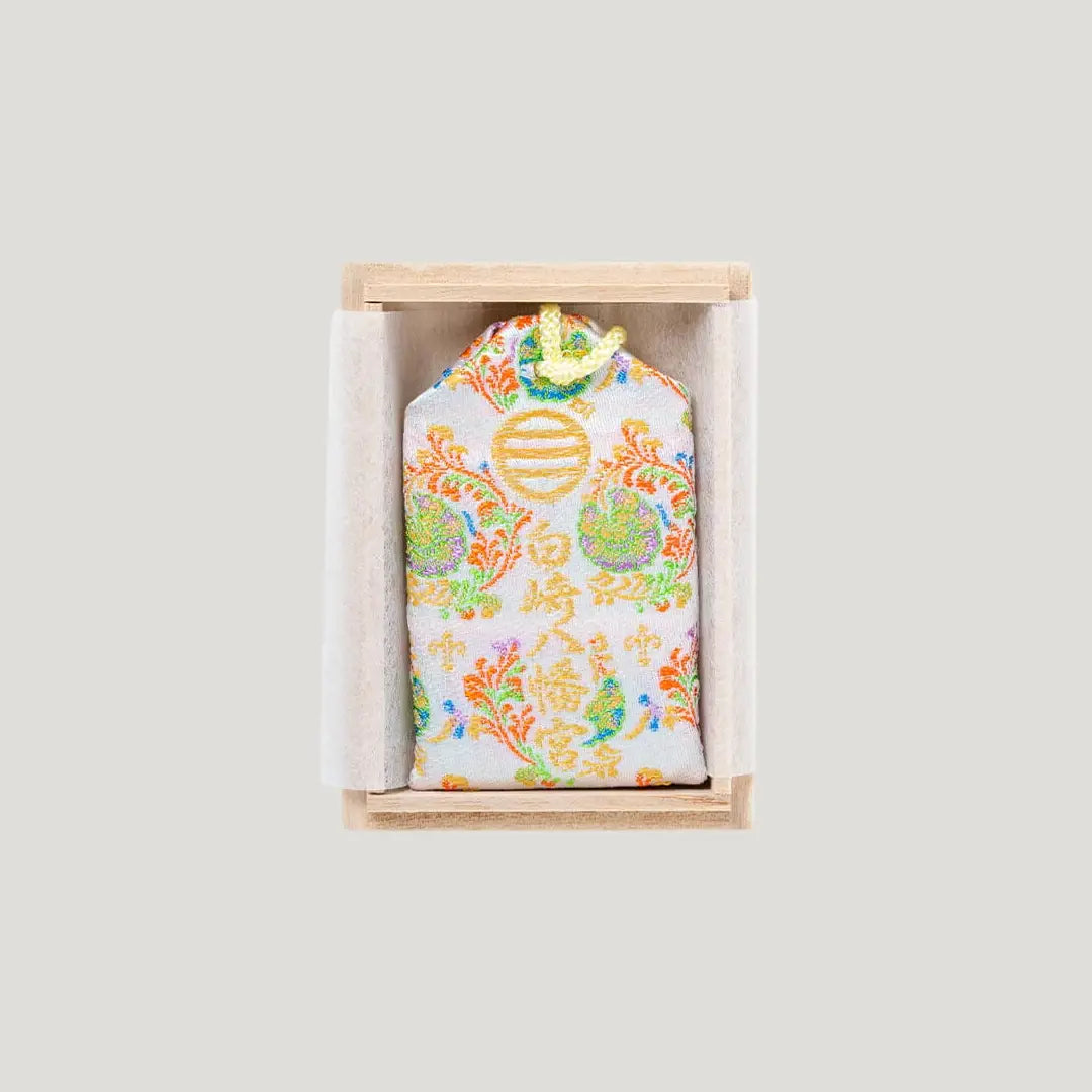Recovery and Healing Omamori with white and multicolor embroidery in wooden box from Shirasaki Shrine