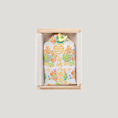 Recovery and Healing Omamori with white and multicolor embroidery in wooden box from Shirasaki Shrine