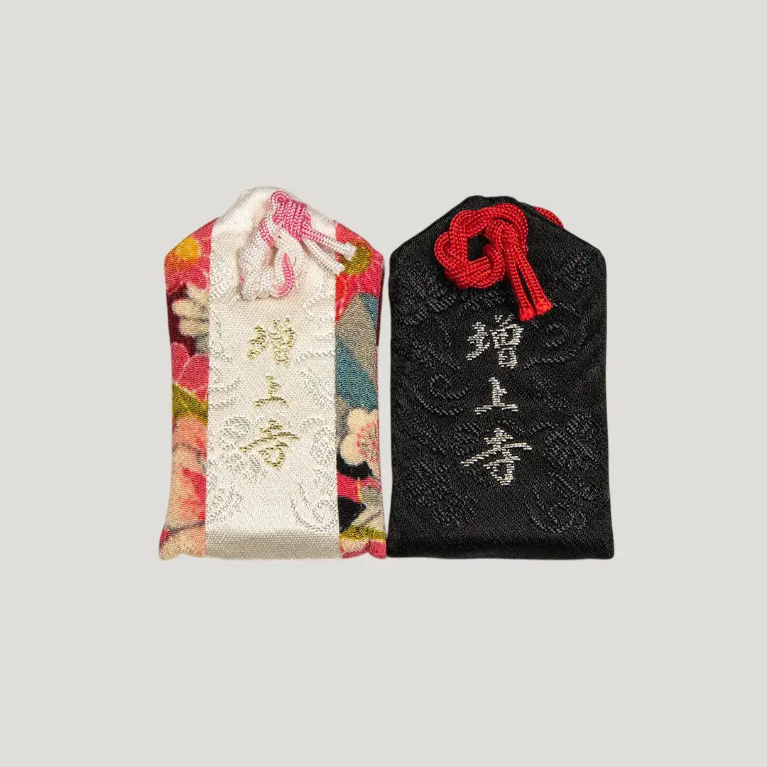 Back of 勝運御守 (Victory & Fortune Omamori) from Zojoji Temple – two variants shown: Black (黒) and Patterned – 雅色. Each sold individually.