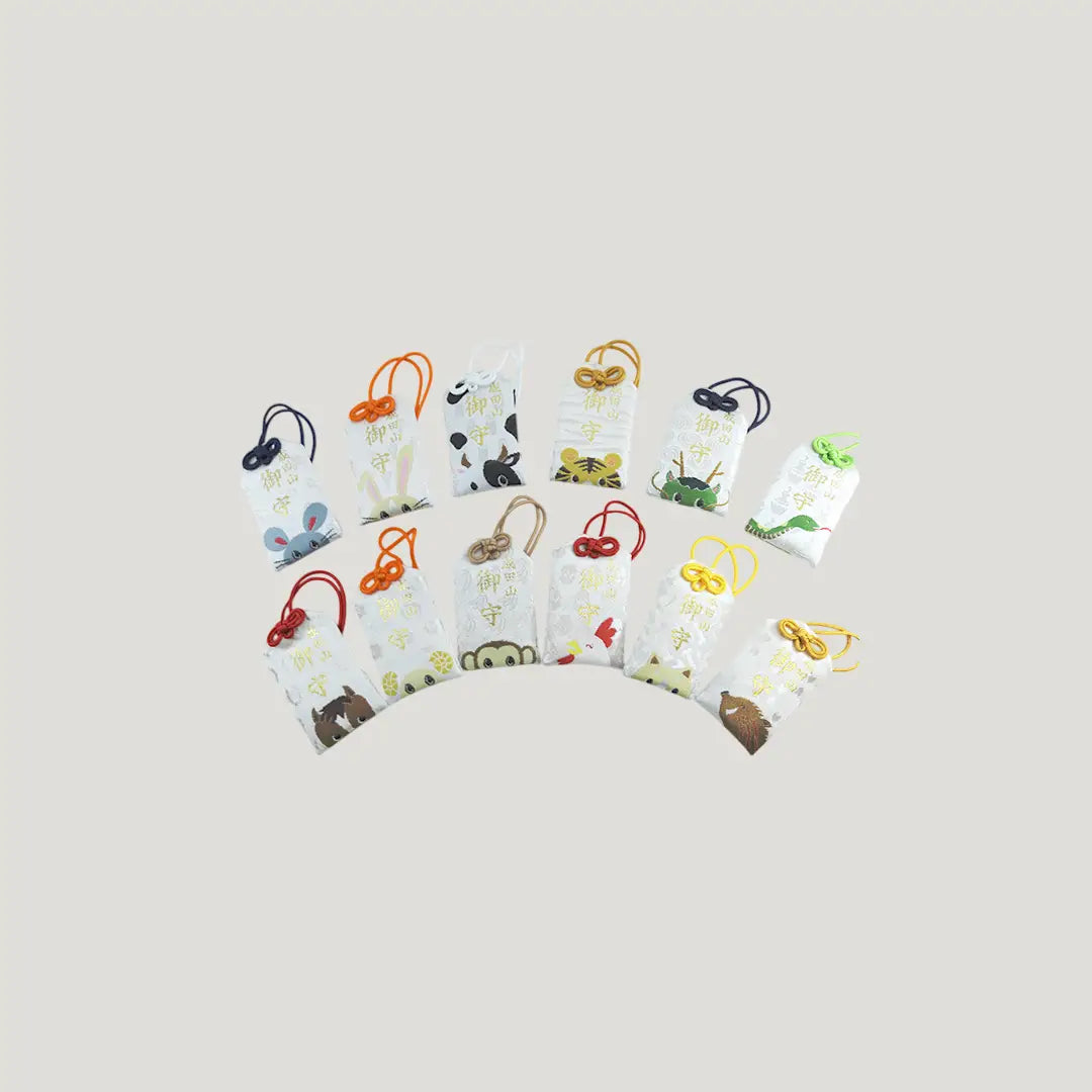 Zodiac Animal Omamori set from Osaka Naritasan Fudoson featuring 12 embroidered animals for protection and good fortune