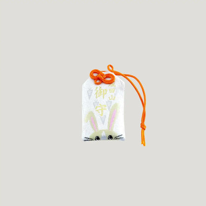 Rabbit Zodiac Omamori from Osaka Naritasan Fudoson featuring long ears and orange cord